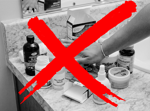 Bathroom counter covered in castor oil, growth serums, and vitamins crossed out with a red X